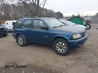 2000 Honda Passport z VIN 4S6DM58WXY4414843, wystawiony jako IAAI lot #41325250 z przebiegiem 100 909 mil mil oraz . Historia ofert i sprzedaży dostępna na DreamBid. Obrazek 1.