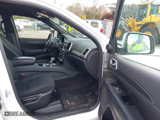2018 Jeep Grand Cherokee Laredo E with VIN 1C4RJFAG8JC424609, listed as a IAAI auction lot 41124689 with 101,643 mi miles. Bid and sale history available at carsss.com. Image 5.