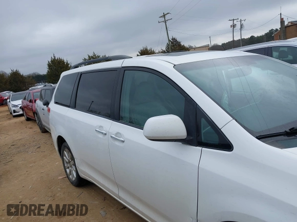 2011 Toyota Sienna XLE with VIN 5TDDK3DC0BS015244, listed as a IAAI auction lot 41413002 with 128,591 mi miles. Bid and sale history available at carsss.com. Image 13.