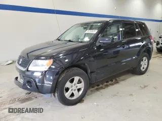 2012 Suzuki Grand Vitara Premium z VIN JS3TD0D66C4100814, wystawiony jako Copart lot #89250025 z przebiegiem 102 381 mil mil oraz Szkody całkowita. Historia ofert i sprzedaży dostępna na DreamBid. Obrazek 1.