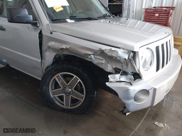 2009 Jeep Patriot Sport with VIN 1J4FT28BX9D160194, listed as a IAAI auction lot 41253940 with 104,339 mi miles. Bid and sale history available at carsss.com. Image 6.