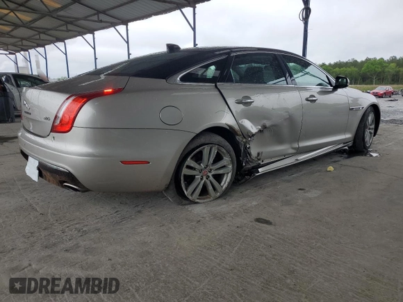 2016 Jaguar XJ Portfolio with VIN SAJWA2G70G8V93006, listed as a Copart auction lot 52324635 with 123,690 mi miles and Salvage Title. Bid and sale history available at DreamBid. Image 3.