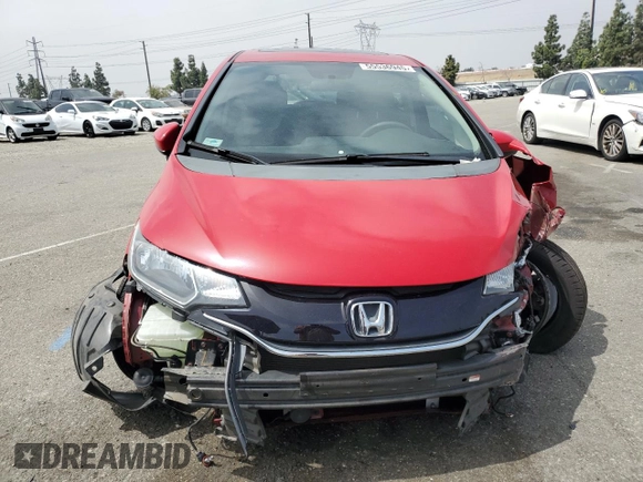 2015 Honda Fit EX-L with VIN 3HGGK5H87FM701108, listed as a Copart auction lot 55536945 with 57,519 mi miles and Salvage title. Bid and sale history available at DreamBid. Image 5.