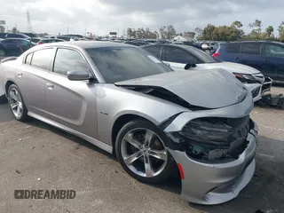 2018 Dodge Charger R/T with VIN 2C3CDXCT4JH125679, listed as a IAAI auction lot 42233699 with 97,239 mi miles and . Bid and sale history available at DreamBid. Image 1.