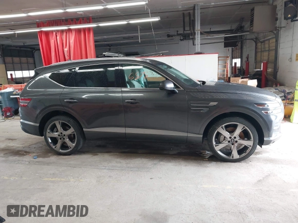 2023 Genesis GV80 with VIN KMUHBDSBXPU112470, listed as a IAAI auction lot 42326878 with 28,302 mi miles and . Bid and sale history available at DreamBid. Image 13.