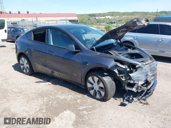 2023 Tesla Model Y Long Range z VIN 7SAYGDEE8PA191415, wystawiony jako IAAI lot #42155577 z przebiegiem 42 149 mil mil oraz . Historia ofert i sprzedaży dostępna na DreamBid. Obrazek 1.