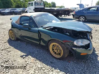 2001 Mazda MX-5 Miata with VIN JM1NB353410203639, listed as a Copart auction lot 56447414 with 131,520 mi miles and Salvage Title. Bid and sale history available at DreamBid. Image 4.