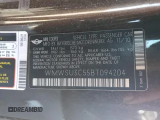 2011 MINI Hardtop with VIN WMWSU3C55BT094204, listed as a Copart auction lot 53994195 with 132,938 mi miles and Clean Title. Bid and sale history available at DreamBid. Image 12.