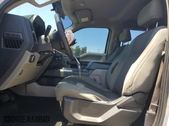 2016 Ford F-150 XL with VIN 1FTEW1CP0GKF41082, listed as a Copart auction lot 62001965 with 205,027 mi miles and Salvage title. Bid and sale history available at DreamBid. Image 7.