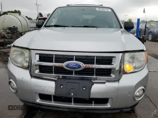 2011 Ford Escape XLT с VIN 1FMCU9DG8BKC62302, выставлен на аукционе Copart как лот 58240715 с пробегом 159 739 миль миль и Списание • Salvage title. История ставок и продаж доступна на DreamBid. Изображение 5.
