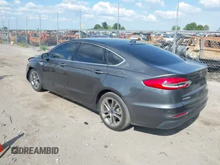 2019 Ford Fusion SEL with VIN 3FA6P0CD7KR159644, listed as a IAAI auction lot 40280287 with 57,329 mi miles. Bid and sale history available at carsss.com. Image 3.
