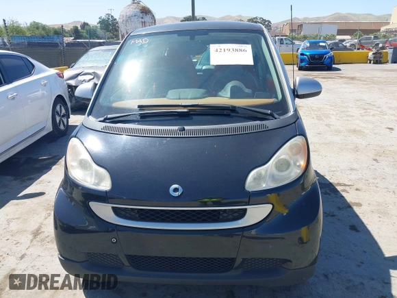 2008 Smart fortwo Pure with VIN WMEEJ31X78K180398, listed as a IAAI auction lot 42193886 with 98,136 mi miles and . Bid and sale history available at DreamBid. Image 6.