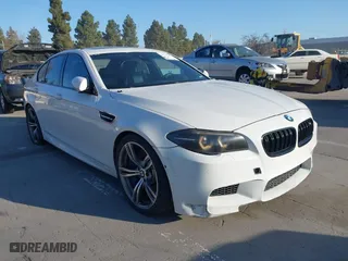 2014 BMW M5 with VIN WBSFV9C55ED593614, listed as a IAAI auction lot 41777369 with 144,076 mi miles. Bid and sale history available at carsss.com. Image 1.