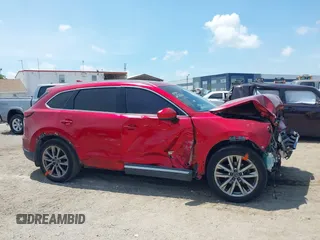 2019 Mazda CX-9 Grand Touring z VIN JM3TCADY5K0302436, wystawiony jako IAAI lot #42323545 z przebiegiem Nie podano mil oraz . Historia ofert i sprzedaży dostępna na DreamBid. Obrazek 13.