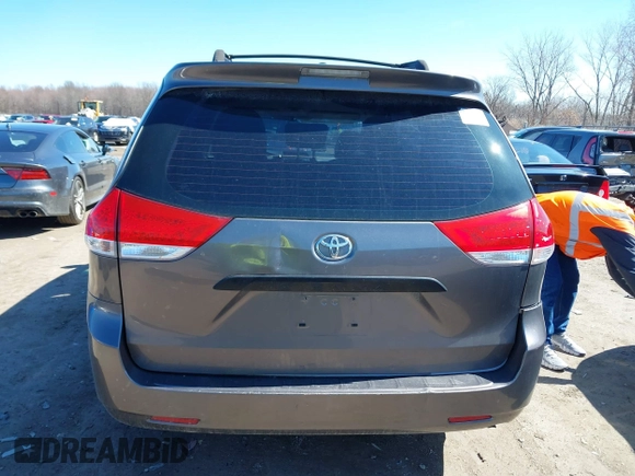 2011 Toyota Sienna with VIN 5TDZK3DC6BS125737, listed as a IAAI auction lot 41815233 with 248,318 mi miles. Bid and sale history available at carsss.com. Image 16.