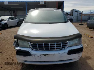2000 Chevrolet Venture LT 1SD z VIN 1GNDX03E3YD337987, wystawiony jako Copart lot #71485544 z przebiegiem 223 183 mil mil oraz Szkody całkowita. Historia ofert i sprzedaży dostępna na DreamBid. Obrazek 5.