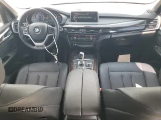 2016 BMW X5 xDrive35i z VIN 5UXKR0C52G0P26716, wystawiony jako Copart lot #56028275 z przebiegiem 128 355 mil mil oraz Szkoda całkowita • Salvage title. Historia ofert i sprzedaży dostępna na DreamBid. Obrazek 8.