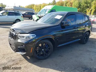 2020 BMW X3 M with VIN 5YMTS0C00L9B87771, listed as a IAAI auction lot 40475009 with 1 miles. Bid and sale history available at carsss.com. Image 18.