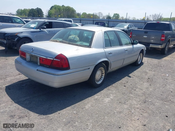 2002 Mercury Grand Marquis LS Premium with VIN 2MEFM75W02X660966, listed as a IAAI auction lot 41869806 with 133,758 mi miles. Bid and sale history available at carsss.com. Image 4.