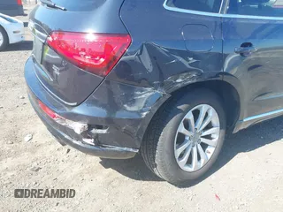 2014 Audi Q5 Premium Plus z VIN WA1LFBFP4EA006181, wystawiony jako IAAI lot #42140321 z przebiegiem 104 870 mil mil oraz . Historia ofert i sprzedaży dostępna na DreamBid. Obrazek 6.