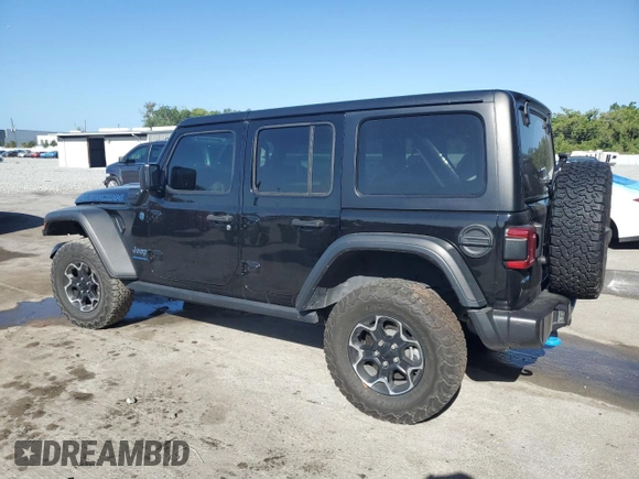 2023 Jeep Wrangler Rubicon z VIN 1C4JJXR62PW663711, wystawiony jako Copart lot #54816255 z przebiegiem 29 123 mil mil oraz Szkoda całkowita • Salvage title. Historia ofert i sprzedaży dostępna na DreamBid. Obrazek 2.
