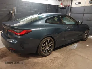 2022 BMW 4 Series 430i xDrive with VIN WBA73AP05NCJ87742, listed as a IAAI auction lot 36773839 with 20,814 mi miles and . Bid and sale history available at carsss.com. Image 4.