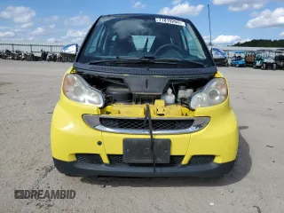 2010 Smart fortwo Pure z VIN WMEEJ3BAXAK371054, wystawiony jako Copart lot #71819294 z przebiegiem 103 177 mil mil oraz Szkoda całkowita • Salvage title. Historia ofert i sprzedaży dostępna na DreamBid. Obrazek 5.