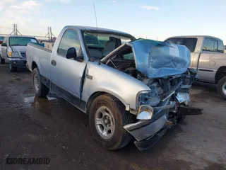 1998 Ford F-150 Standard with VIN 1FTZF1723WKB59904, listed as a IAAI auction lot 41461876 with 189,860 mi miles. Bid and sale history available at carsss.com. Image 1.