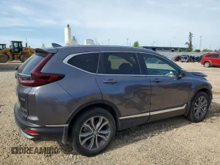2020 Honda CR-V Touring with VIN 2HKRW2H99LH677964, listed as a Copart auction lot 61169915 with 65,915 mi miles and Salvage title. Bid and sale history available at DreamBid. Image 3.