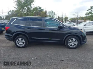 2016 Honda Pilot LX with VIN 5FNYF6H16GB095208, listed as a IAAI auction lot 40512118 with 150,280 mi miles. Bid and sale history available at carsss.com. Image 13.
