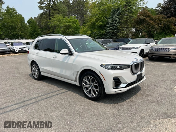 2019 BMW X7 xDrive50i z VIN 5UXCX4C55KLS38210, wystawiony jako Copart lot #59935315 z przebiegiem 126 853 mil mil oraz Czysty tytuł • Clean title. Historia ofert i sprzedaży dostępna na DreamBid. Obrazek 1.