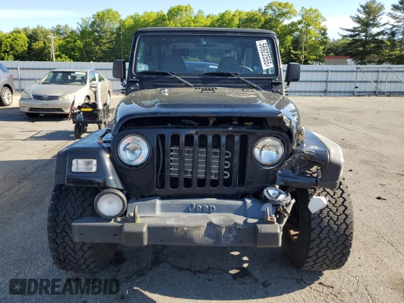 2001 Jeep Wrangler Sport with VIN 1J4FA49S21P339042, listed as a Copart auction lot 56922555 with 113,315 mi miles and Salvage title. Bid and sale history available at DreamBid. Image 5.