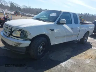 2002 Ford F-150 XL with VIN 1FTRX17L32NA13159, listed as a IAAI auction lot 41653814 with 435,395 mi miles. Bid and sale history available at carsss.com. Image 17.
