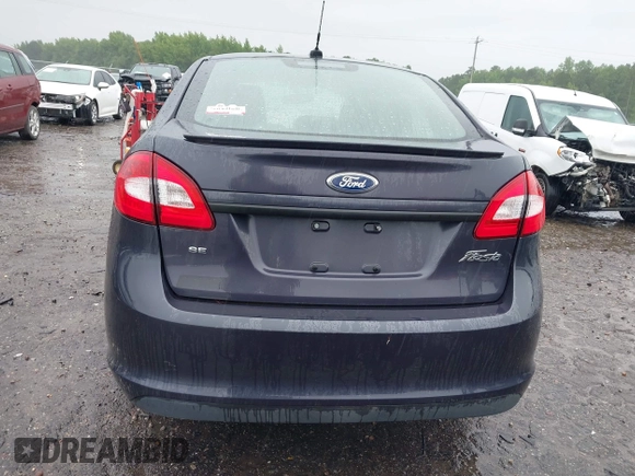 2012 Ford Fiesta SE z VIN 3FADP4BJ4CM155538, wystawiony jako IAAI lot #42352703 z przebiegiem 100 666 mil mil oraz . Historia ofert i sprzedaży dostępna na DreamBid. Obrazek 16.