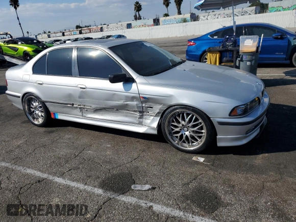 2000 BMW 5 Series 528iA with VIN WBADM6346YGU26119, listed as a Copart auction lot 73773084 with 177,616 mi miles and Salvage Title. Bid and sale history available at carsss.com. Image 4.
