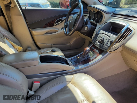 2012 Buick LaCrosse Premium 1 z VIN 1G4GD5E37CF151479, wystawiony jako IAAI lot #41710321 z przebiegiem 156 673 mil mil oraz . Historia ofert i sprzedaży dostępna na DreamBid. Obrazek 5.