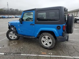 2012 Jeep Wrangler Arctic z VIN 1C4AJWBG3CL148046, wystawiony jako Copart lot #54186285 z przebiegiem 156 639 mil mil oraz Szkoda całkowita • Salvage title. Historia ofert i sprzedaży dostępna na DreamBid. Obrazek 2.