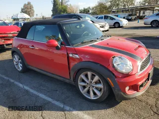 2013 MINI Convertible S z VIN WMWZP3C52DT705587, wystawiony jako Copart lot #44391775 z przebiegiem 83 506 mil mil oraz Szkoda całkowita • Salvage title. Historia ofert i sprzedaży dostępna na DreamBid. Obrazek 4.