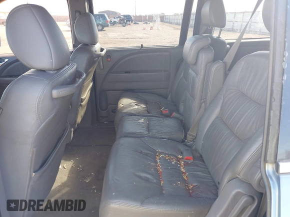 2010 Honda Odyssey EX-L with VIN 5FNRL3H7XAB052742, listed as a IAAI auction lot 41705935 with 205,190 mi miles and . Bid and sale history available at DreamBid. Image 8.