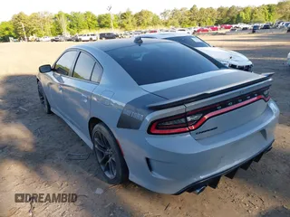 2021 Dodge Charger R/T with VIN 2C3CDXCT8MH594715, listed as a IAAI auction lot 42257288 with 11,570 mi miles and . Bid and sale history available at DreamBid. Image 3.