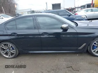 2020 BMW 5 Series M550i xDrive z VIN WBAJS7C09LCD45078, wystawiony jako IAAI lot #41850274 z przebiegiem 75 613 mil mil oraz . Historia ofert i sprzedaży dostępna na DreamBid. Obrazek 13.