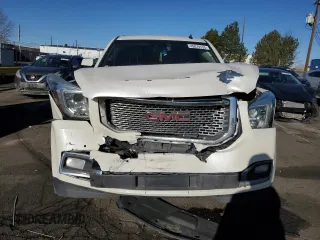 2015 GMC Yukon Denali with VIN 1GKS2CKJ7FR183710, listed as a Copart auction lot 49074135 with 230,526 mi miles and Salvage Title. Bid and sale history available at carsss.com. Image 5.