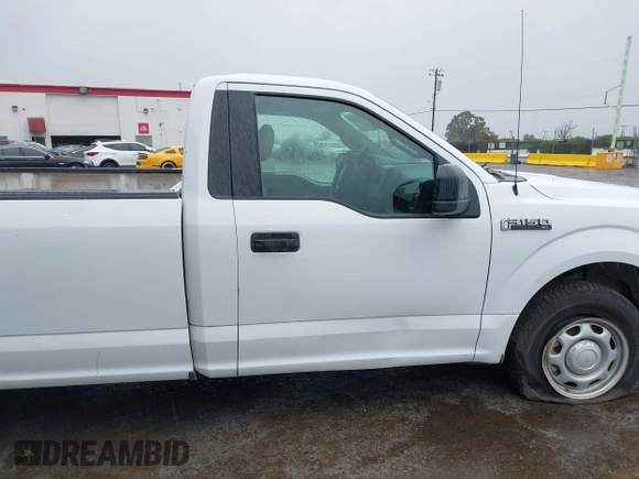2016 Ford F-150 XL with VIN 1FTMF1C89GKF71802, listed as a IAAI auction lot 41557014 with 129,794 mi miles. Bid and sale history available at carsss.com. Image 13.