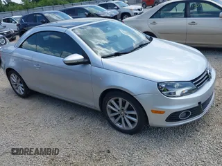 2012 Volkswagen Eos Komfort with VIN WVWBW7AH2CV000027, listed as a IAAI auction lot 42591797 with 77,447 mi miles and . Bid and sale history available at DreamBid. Image 1.