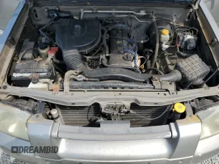 2003 Nissan Frontier XE with VIN 1N6DD26T43C452553, listed as a Copart auction lot 53139715 with 217,731 mi miles and Salvage title. Bid and sale history available at DreamBid. Image 11.