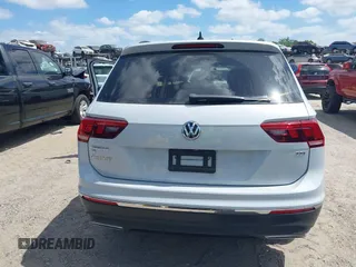 2018 Volkswagen Tiguan SEL with VIN 3VV3B7AX5JM053045, listed as a IAAI auction lot 41963017 with 77,495 mi miles and . Bid and sale history available at DreamBid. Image 16.