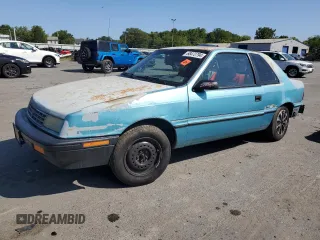 1992 Plymouth Sundance z VIN 1P3XP24D7NN120553, wystawiony jako Copart lot #68472794 z przebiegiem 148 535 mil mil oraz Szkody całkowita. Historia ofert i sprzedaży dostępna na DreamBid. Obrazek 1.