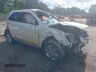 2013 Chevrolet Equinox LTZ z VIN 1GNALFEK0DZ125405, wystawiony jako IAAI lot #42209771 z przebiegiem 115 645 mil mil oraz . Historia ofert i sprzedaży dostępna na DreamBid. Obrazek 1.