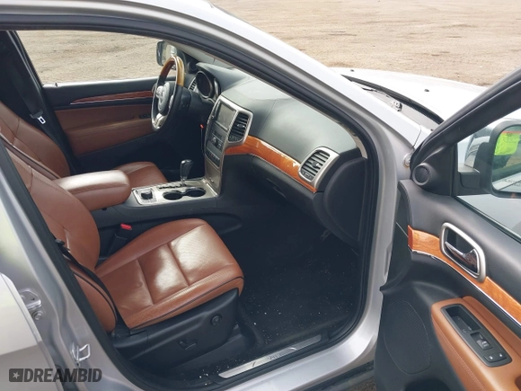 2012 Jeep Grand Cherokee Overland with VIN 1C4RJFCGXCC292257, listed as a IAAI auction lot 41844192 with 182,522 mi miles. Bid and sale history available at carsss.com. Image 5.