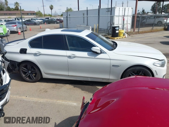 2015 BMW 5 Series 535i with VIN WBA5B1C58FG128061, listed as a IAAI auction lot 41838117 with 97,131 mi miles and . Bid and sale history available at carsss.com. Image 13.